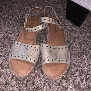 Gently worn gold sandals by Mina